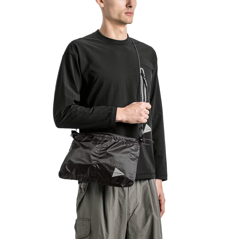 AND WANDER | Cool Touch Pocket L//S Tee Black