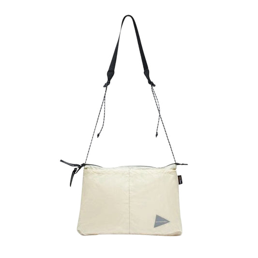AND WANDER | Sil Sacoche OFF WHITE