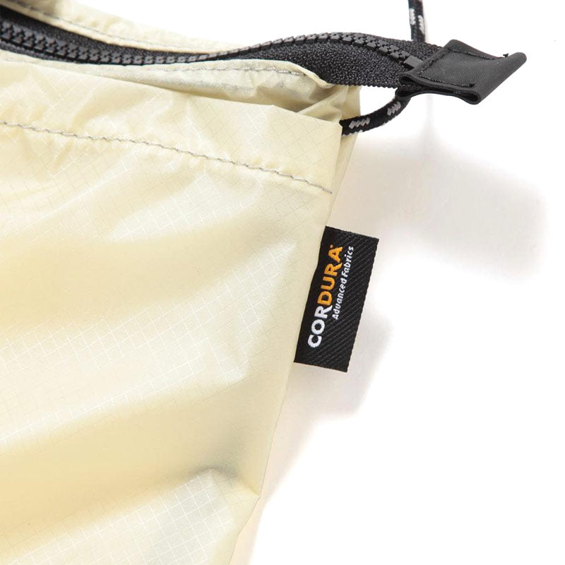 AND WANDER | Sil Sacoche Off White