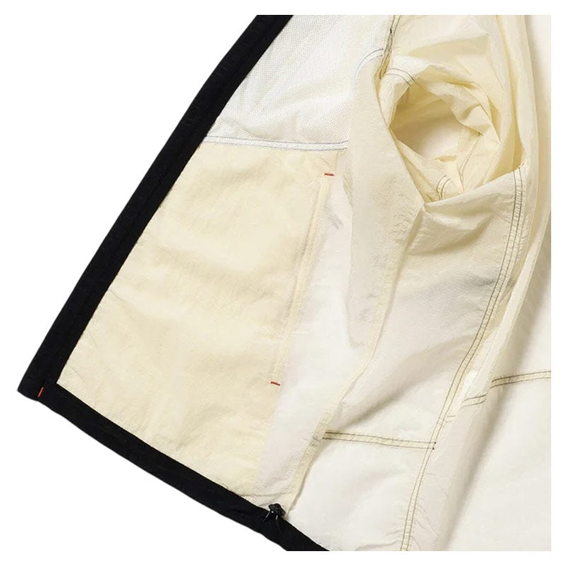 AND WANDER | x ROA Ripstop Wnd Jacket Off White