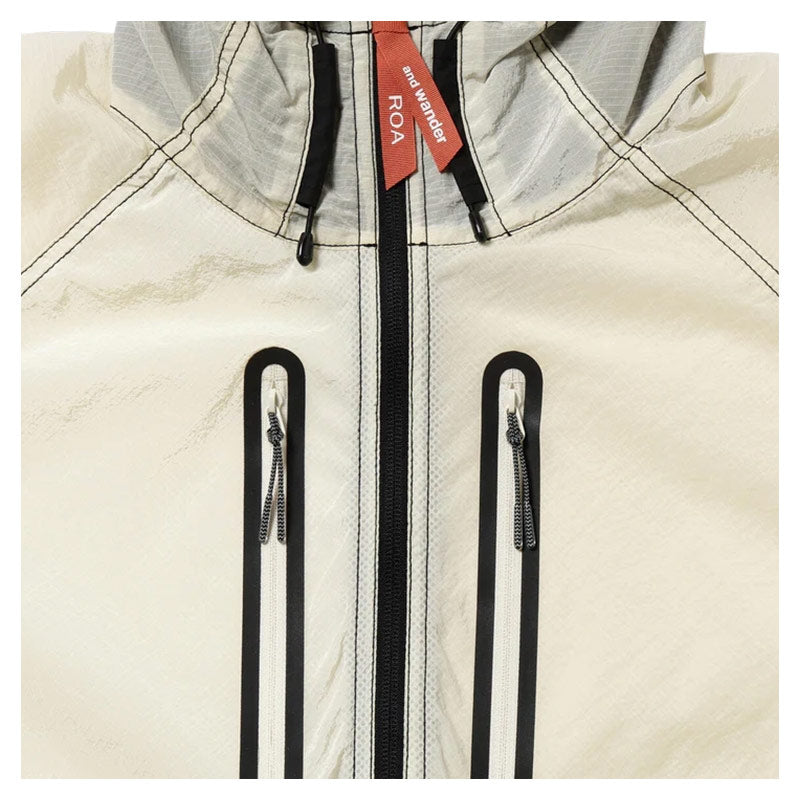 AND WANDER | x ROA Ripstop Wnd Jacket Off White