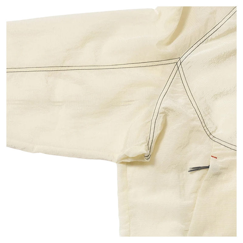 AND WANDER | x ROA Ripstop Wnd Jacket Off White