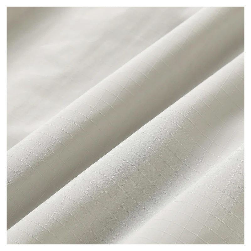AND WANDER | Women's Oversized Cargo Skirt Off White