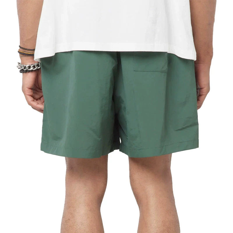 MUSEUM OF PEACE & QUIET Wordmark Nylon 5" Shorts Forest